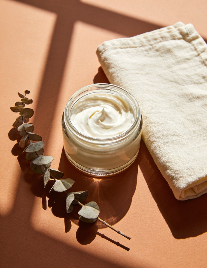 Sanatlyn body care whipped body butter flat lay with linen towel