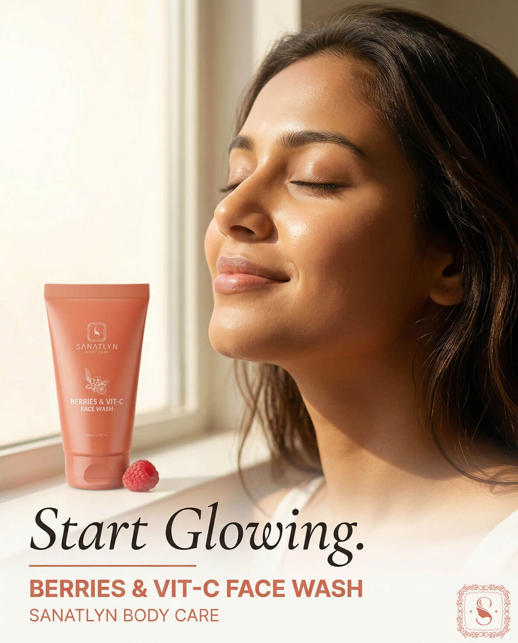 Woman with closed eyes next to a tube of Sanatlyn Berries & Vitamin C Face Wash with berries on a windowsill.